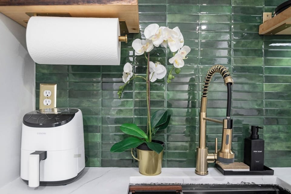 A fresh white kitchen with all the basics for a stress-free stay.