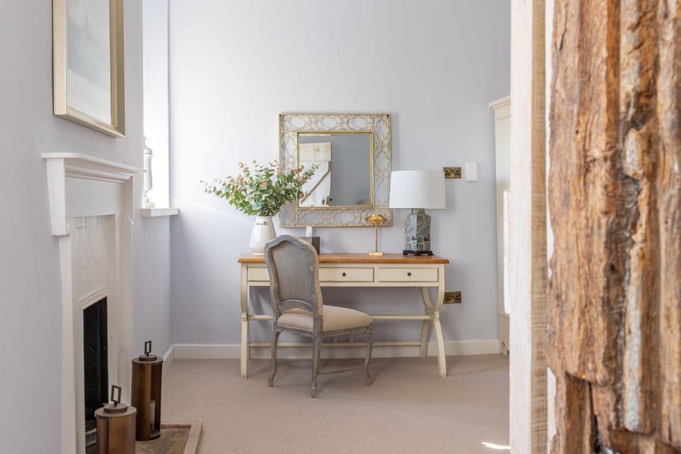 A super king-size bedroom at Priory East Gate, Essex