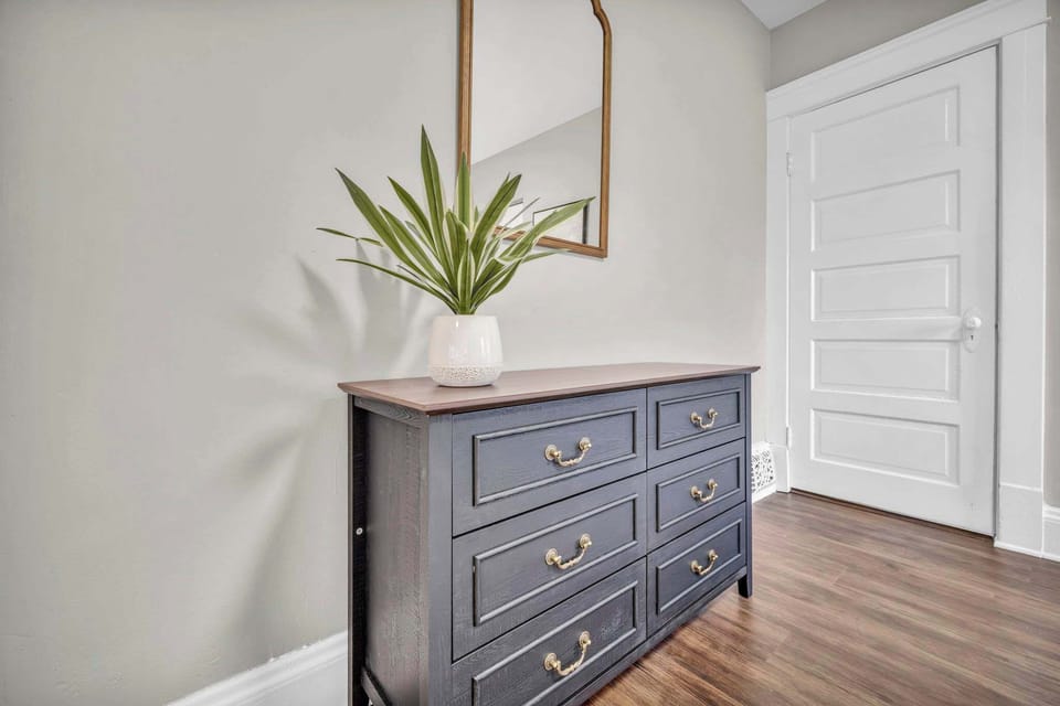 A touch of charm and modern simplicity this stylish hallway nook adds warmth, character, and a welcoming feel to your stay.