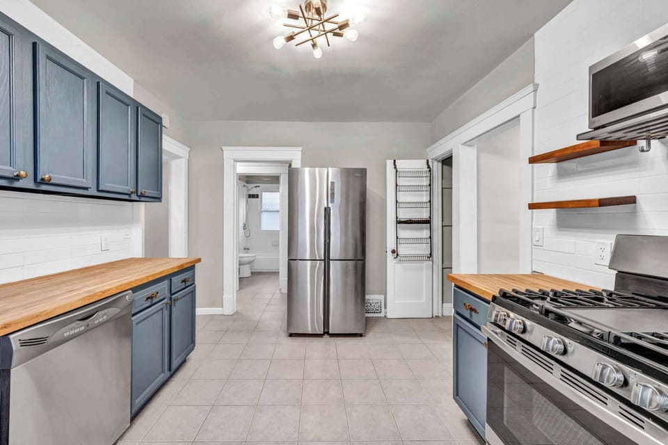 A bright and thoughtfully designed kitchen where modern style meets everyday comfort. Perfect for cooking, gathering, and making your stay feel effortlessly at home.