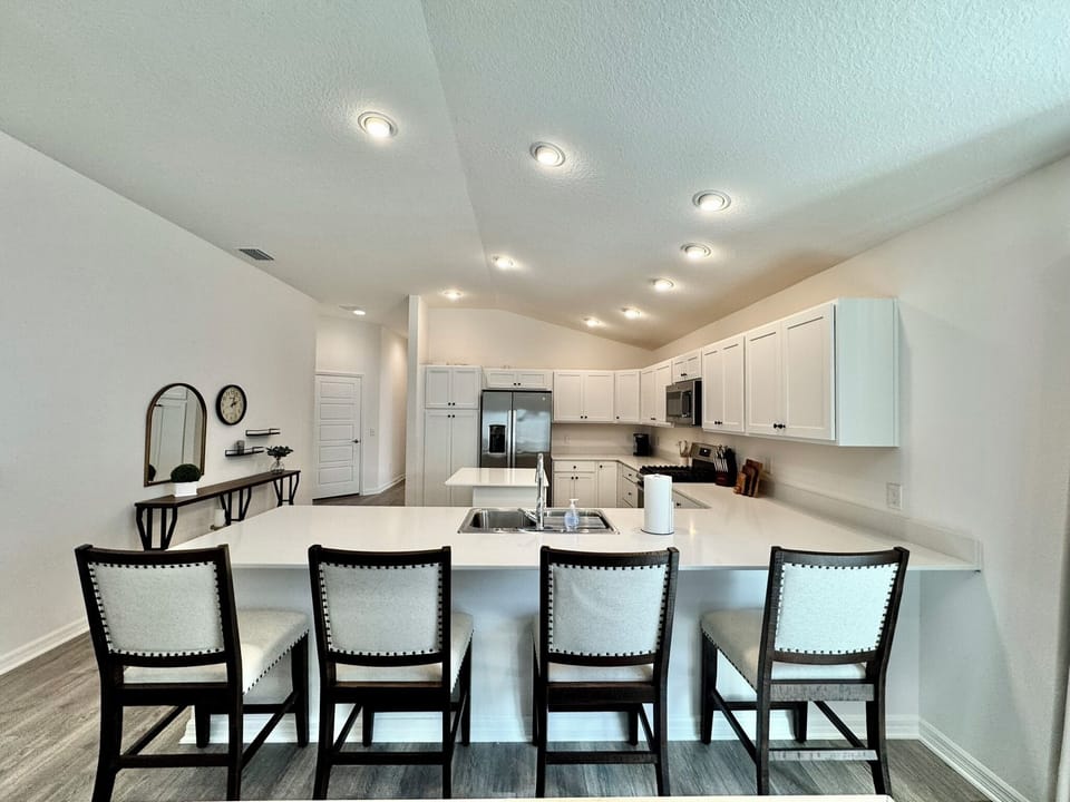 Vaulted Ceilings and Breakfast Bar in the Kitchen