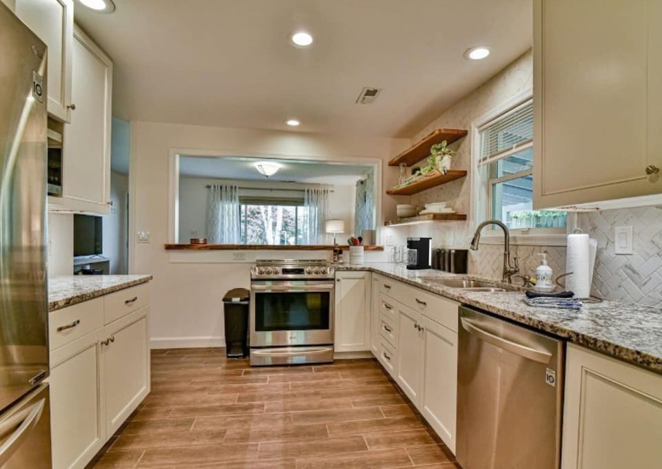 Modern kitchen comes fully equipped with coffee, tea, sugar and everything needed to whip up a quick meal