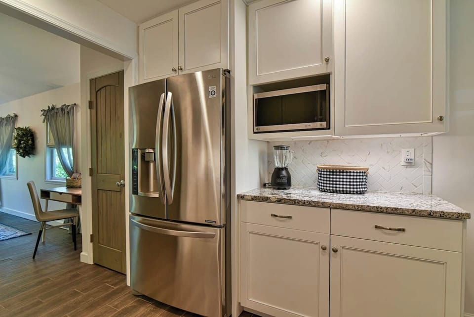 Full size refrigerator with ice/water in door
Blender, toaster, microwave, coffee marker provided