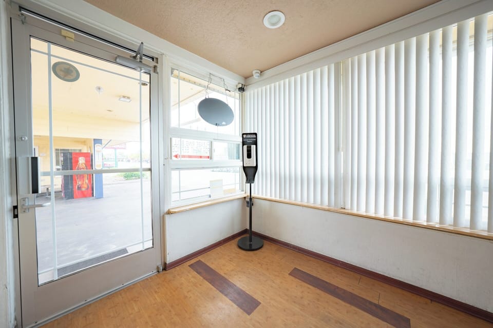 Enter smoothly through secure doors into a light-filled lobby.