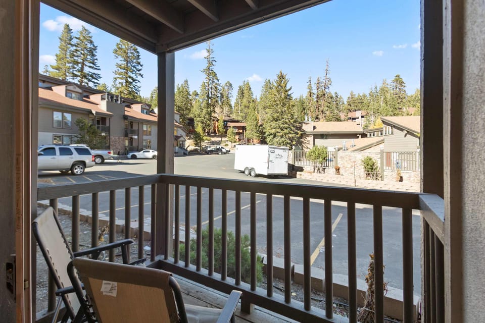 Small private deck with seating to enjoy the morning mountain air.