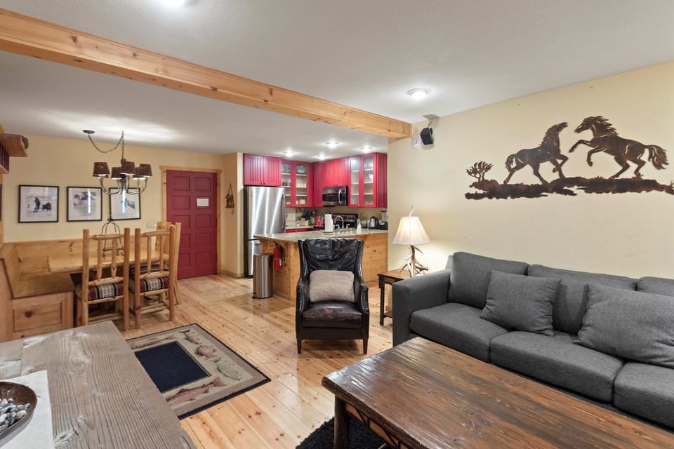 Hardwood floors flow through the bright, inviting open concept space.