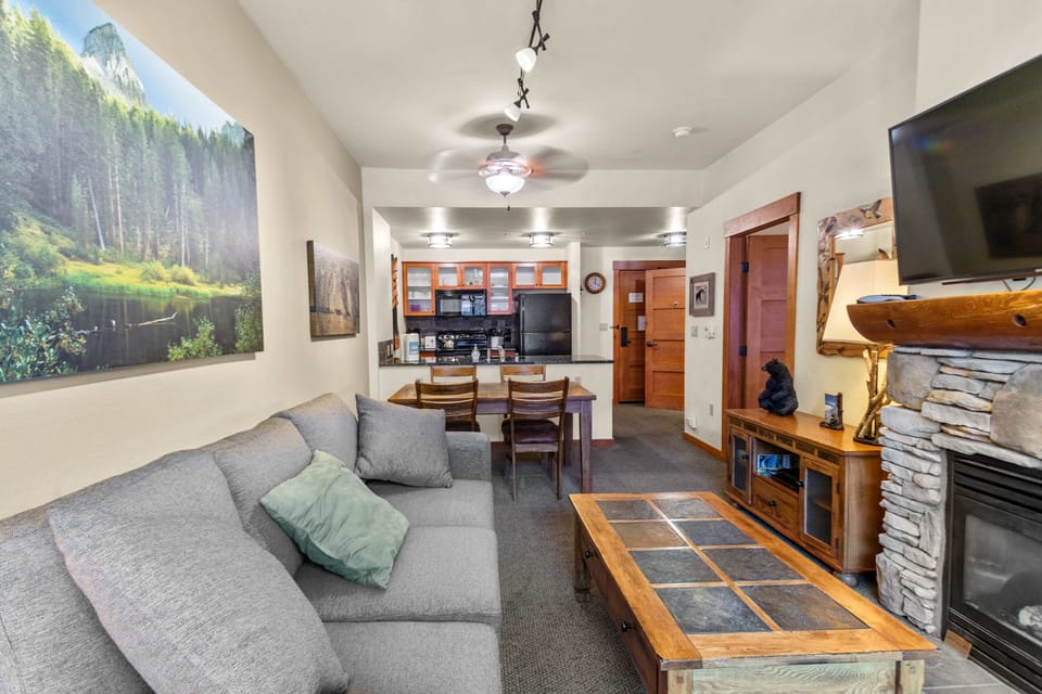 Cozy living area with gas fireplace, Smart TV.