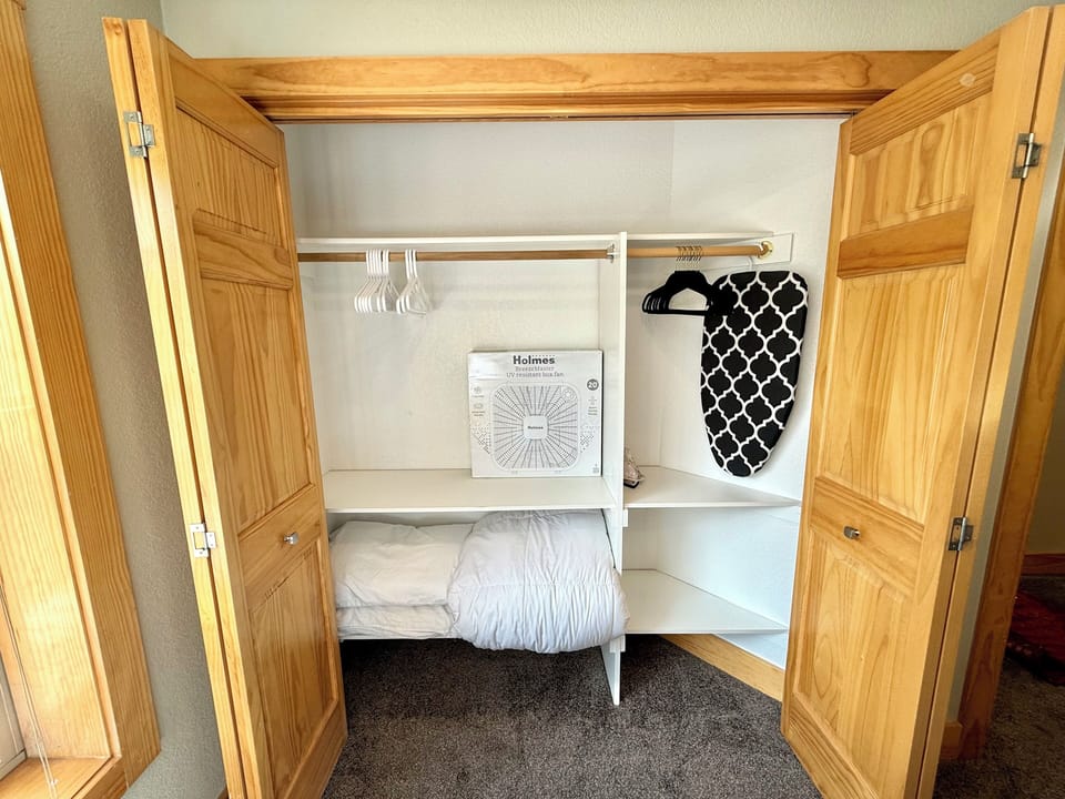 Ample storage as well as hangers, extra pillows, extra blankets, comforter, fans