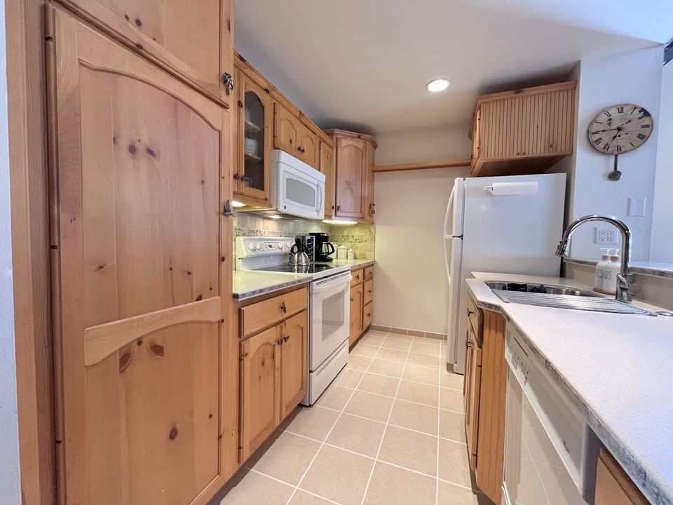 Kitchen is fully equipped with everything you need to cook.