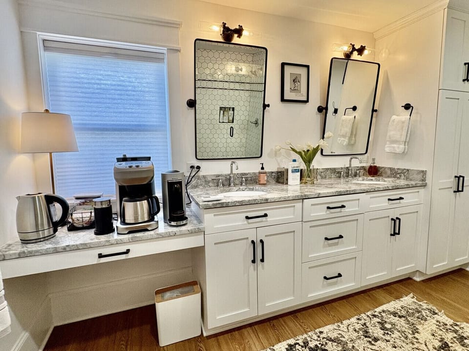 Fully stocked coffee bar in bathroom