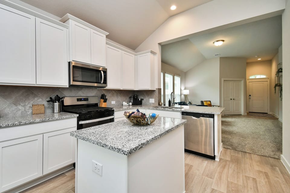 There is space to spread out when preparing meals.