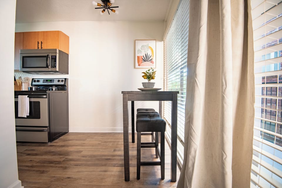 Compact kitchen-dining setup designed for comfort and ease.