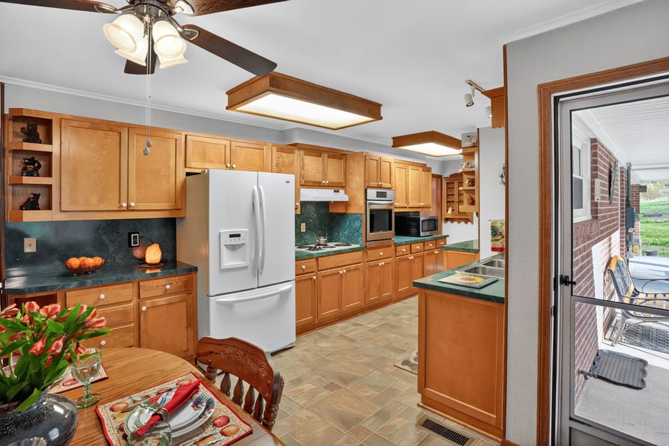 Fully equipped kitchen with modern appliances and ample counter space