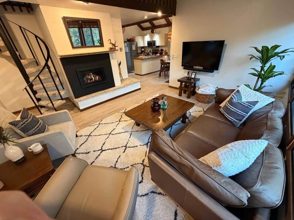 Living room open to the dining room and kitchen