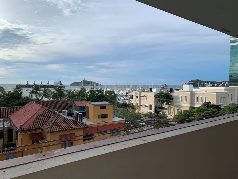 Common area in the building with views toward the marina and El Morro