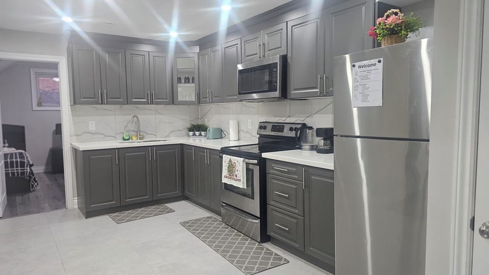 full kitchen with cutlery and utensils 