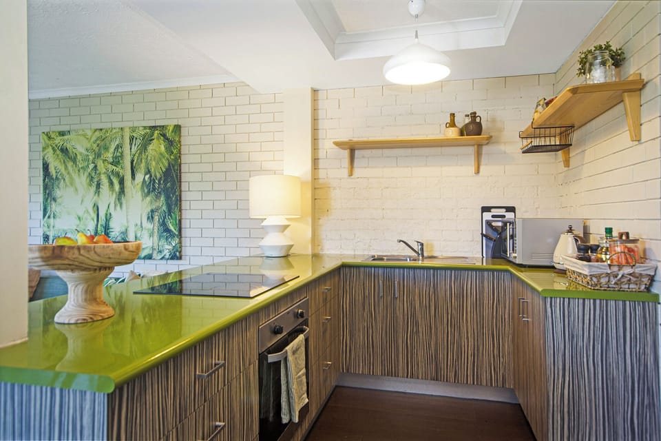 Kitchen includes kettle, toaster, blender, sandwich press, cookware, plates etc