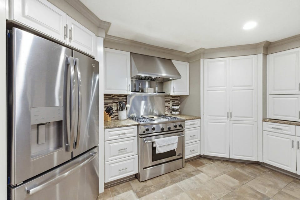 Full-size French door fridge and professional-grade range ready to handle big family meals