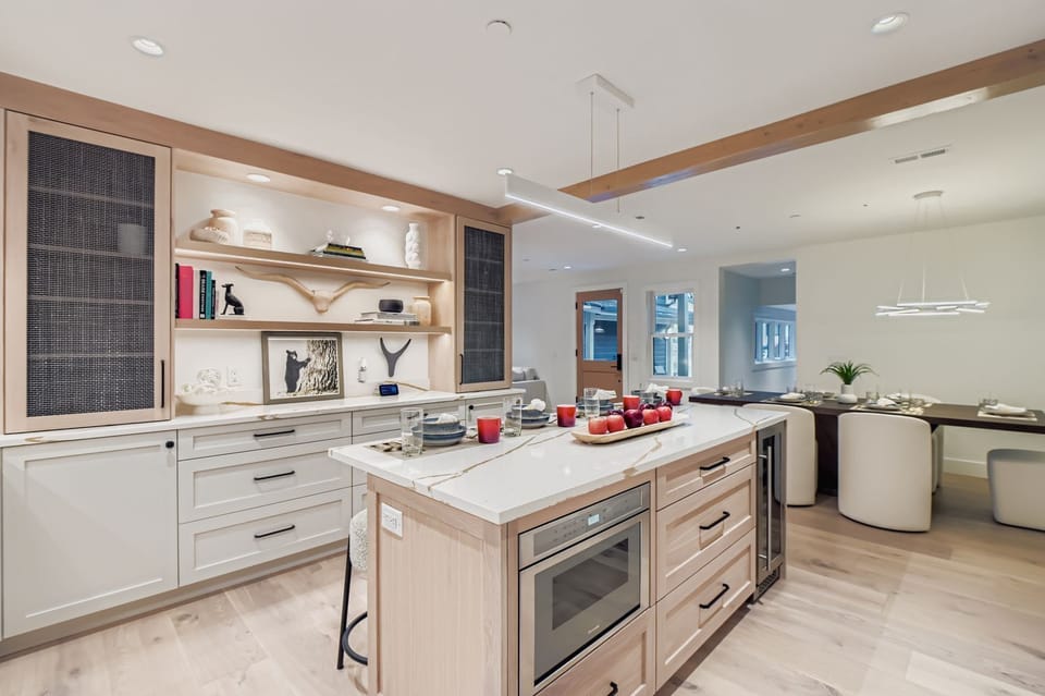 Whip up a feast in the chef's kitchen, featuring professional-grade stainless steel appliances, a wine fridge, and granite countertops. Perfect for your Park City escape.