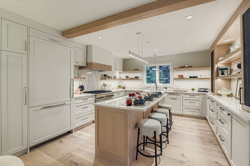 Whip up a feast in the chef's kitchen, featuring professional-grade stainless steel appliances, a wine fridge, and granite countertops. Perfect for your Park City escape.