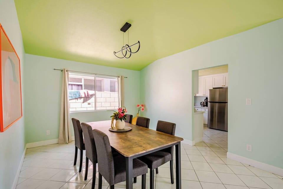 Spacious dining area with seating for six, great for family meals and gatherings.