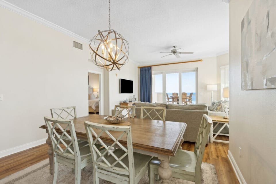 Bright, open dining space with ocean views—perfect for gathering and entertaining.