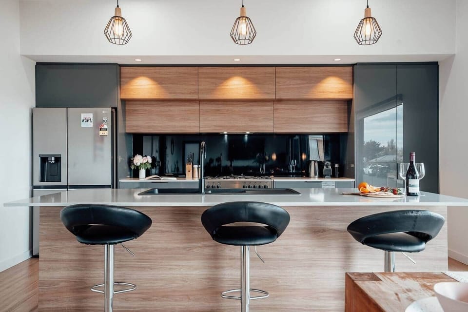Open-plan modern kitchen, fully equipped for preparing delicious meals and entertaining guests.