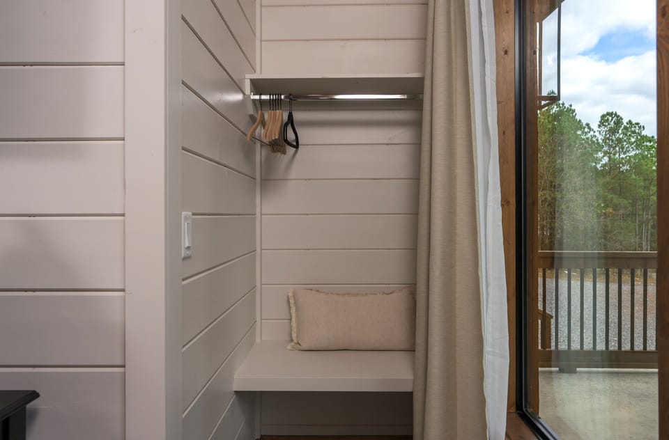 Entryway Nook: Stylish space to unwind, unpack, and enjoy views of nature just steps away!