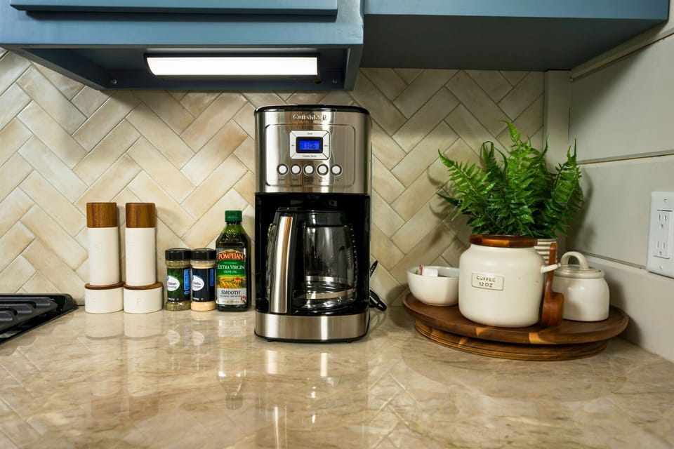 Coffee Station: Brew your perfect cup with our stylish coffee bar, equipped for your daily delights!