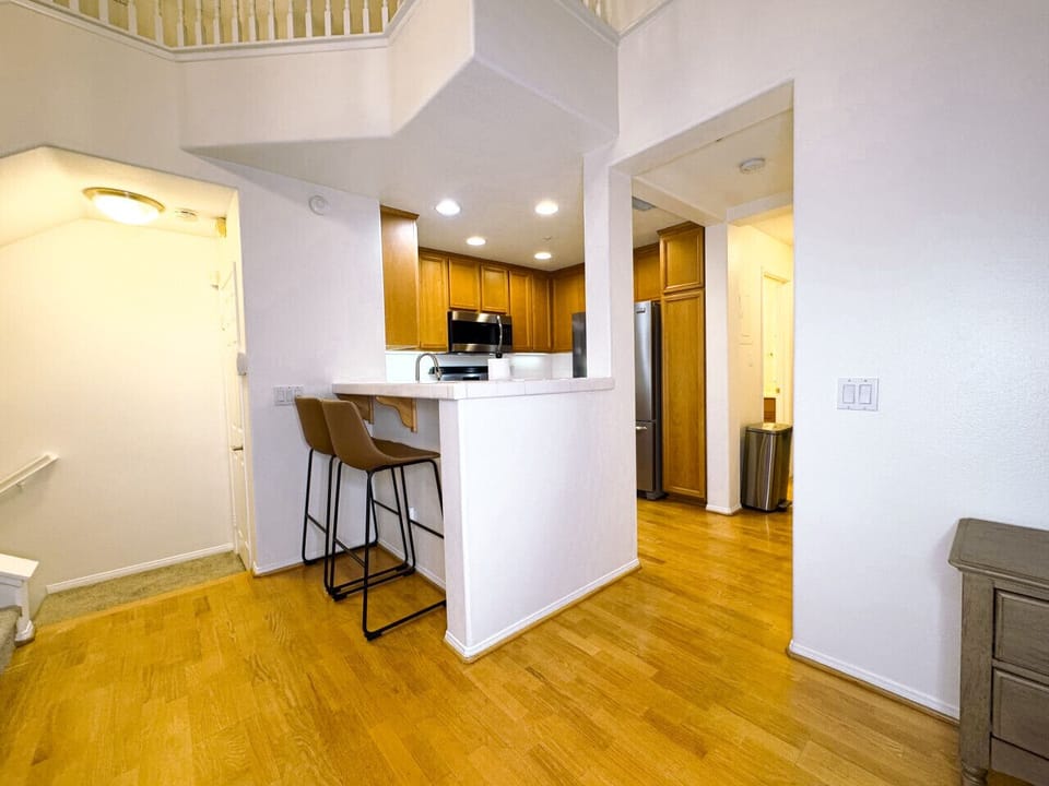 Barstools and kitchen area