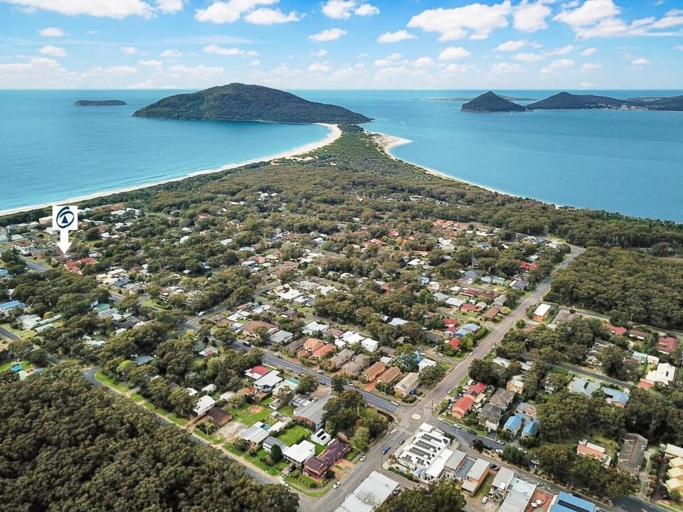 Arrow shows location of property near beach