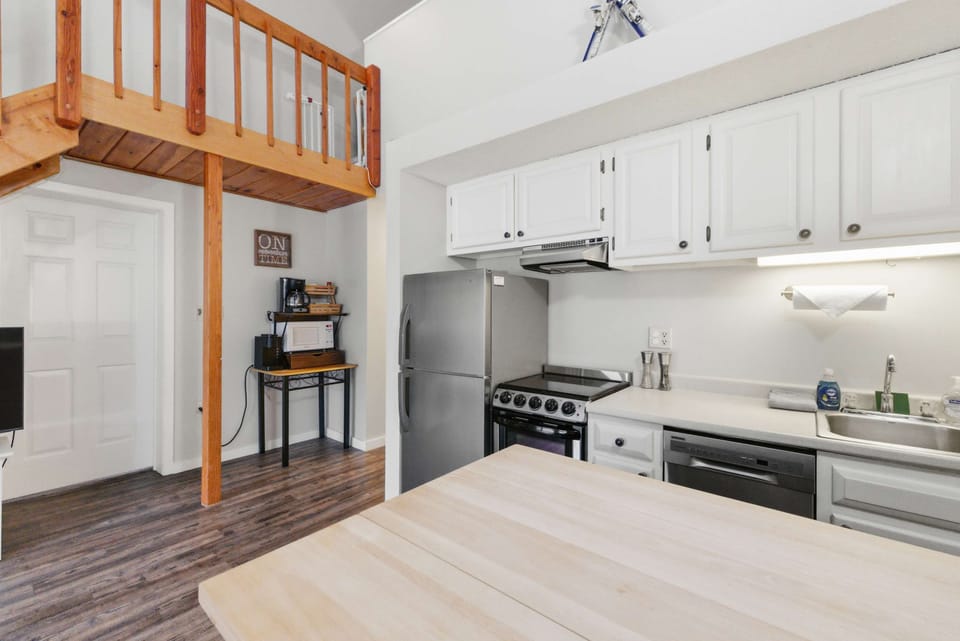 Functional and inviting: cook, snack, and socialize all in one cozy space.