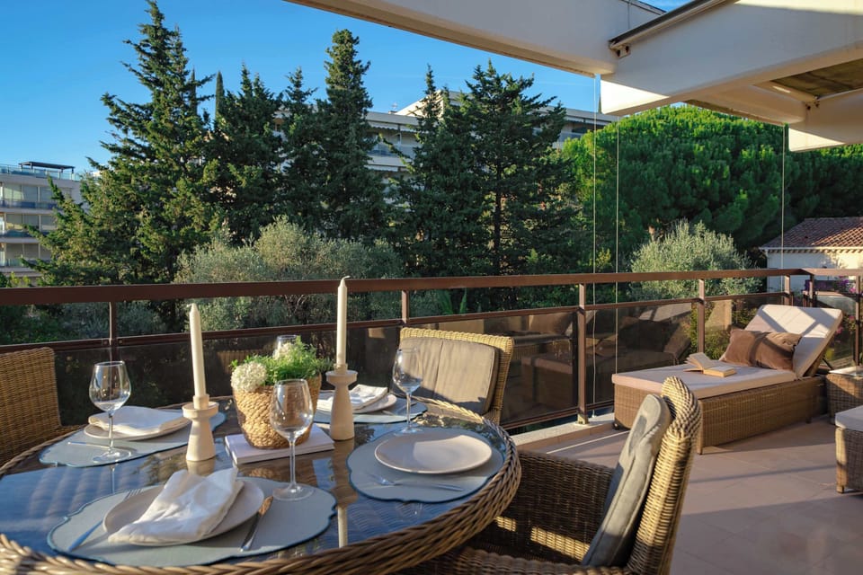 Balcony of Room 23: Spacious sun-kissed balcony with forest views, candlelit dining, and luxe loungers — ideal for romantic evenings, morning coffee, or all-day relaxation.