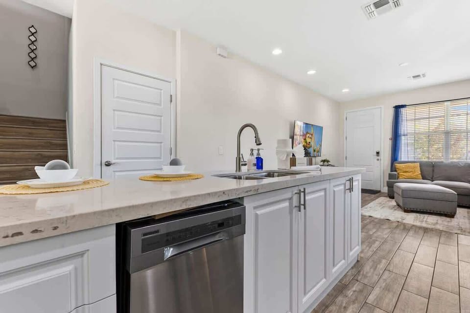 Bright open layout connecting the kitchen and living room.