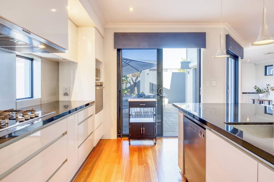 A modern and fully equipped kitchen has all you need to cook up a feast at home. 