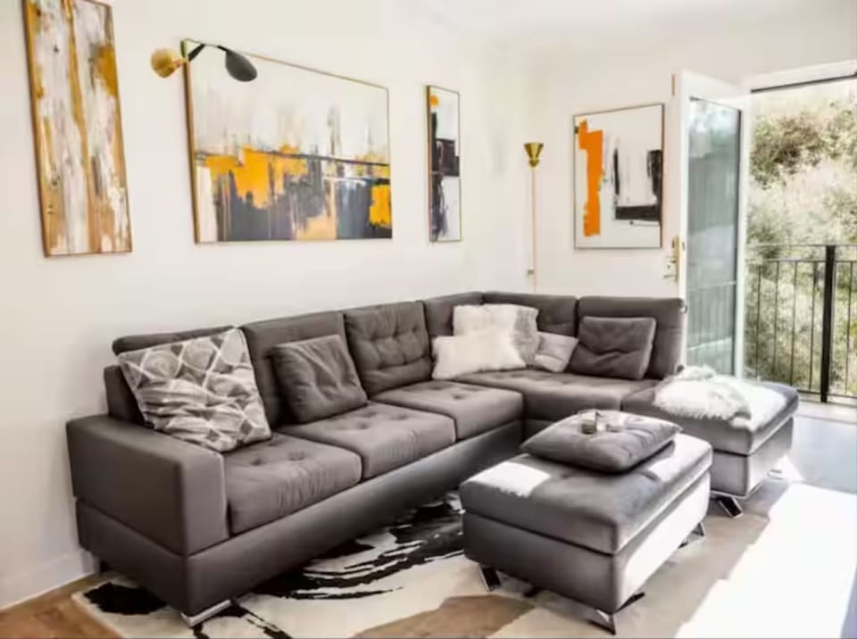 Large Spacious Living room area with Full Size balcony 