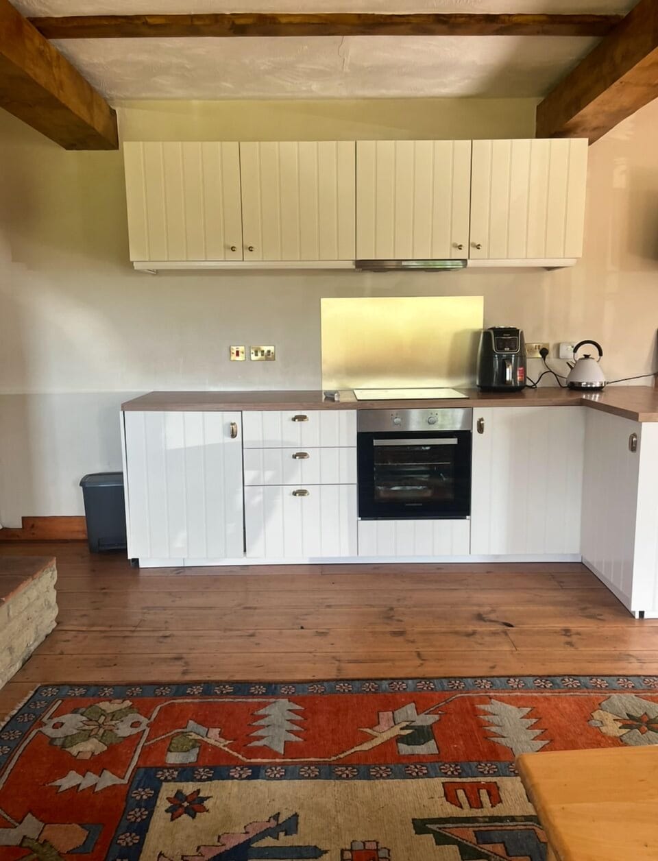 Kitchen, complete with oven, hob, fridge freezer, microwave and washing machine.