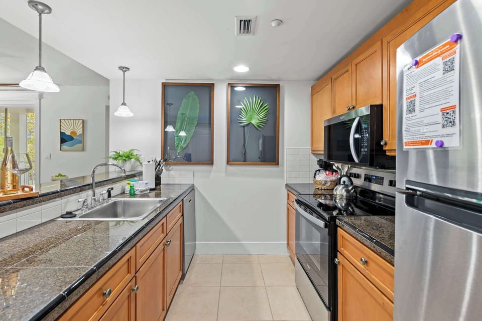 Cook family meals in the modern kitchen, prep beach snacks, brew fresh coffee, or gather for casual bites and conversation.