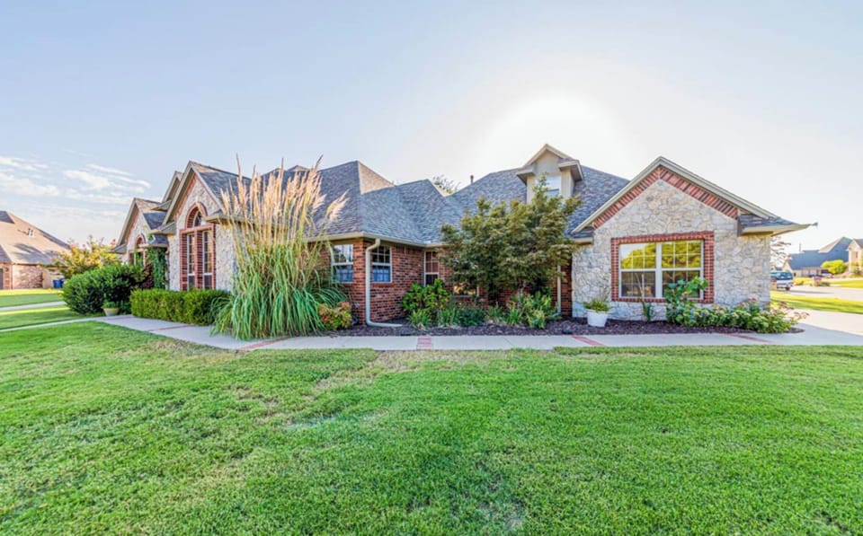 Corner lot with large driveway and street parking available