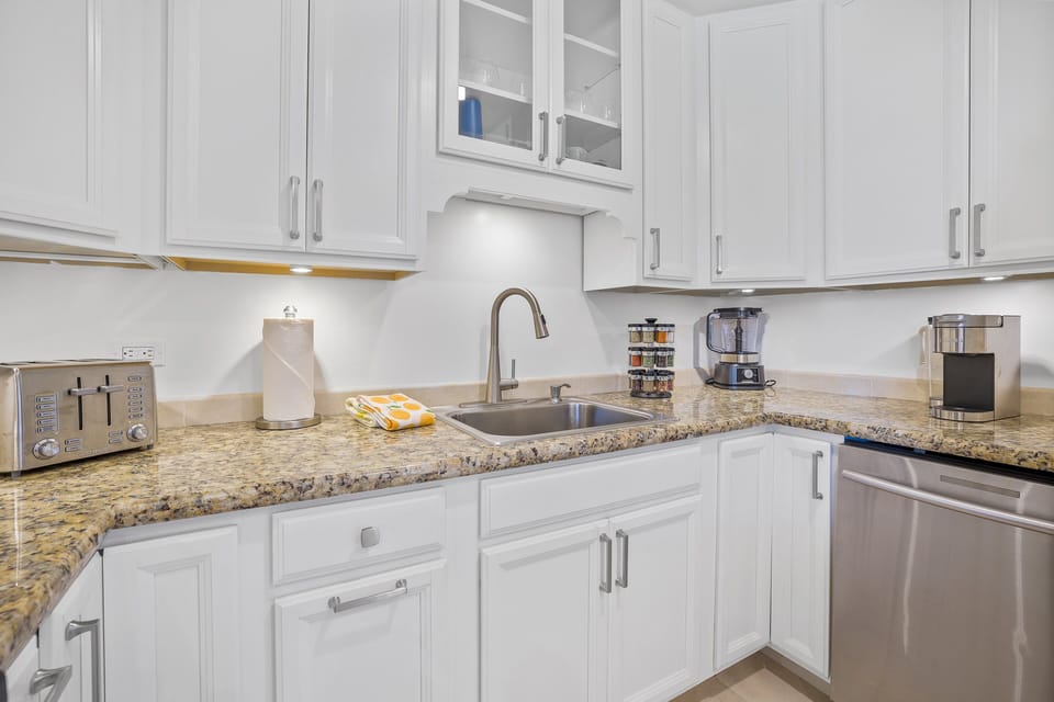 Ample cabinet space, a large sink, and all the tools for your culinary needs. Ready for gourmet meals or quick snacks