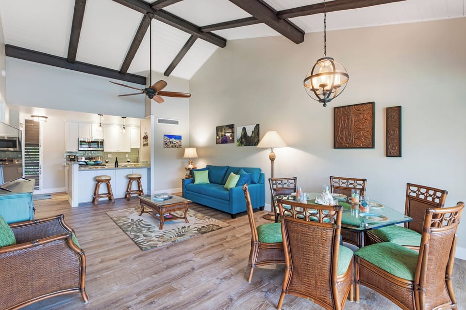 Open-concept living and dining area with direct access to the lanai for seamless indoor-outdoor living.