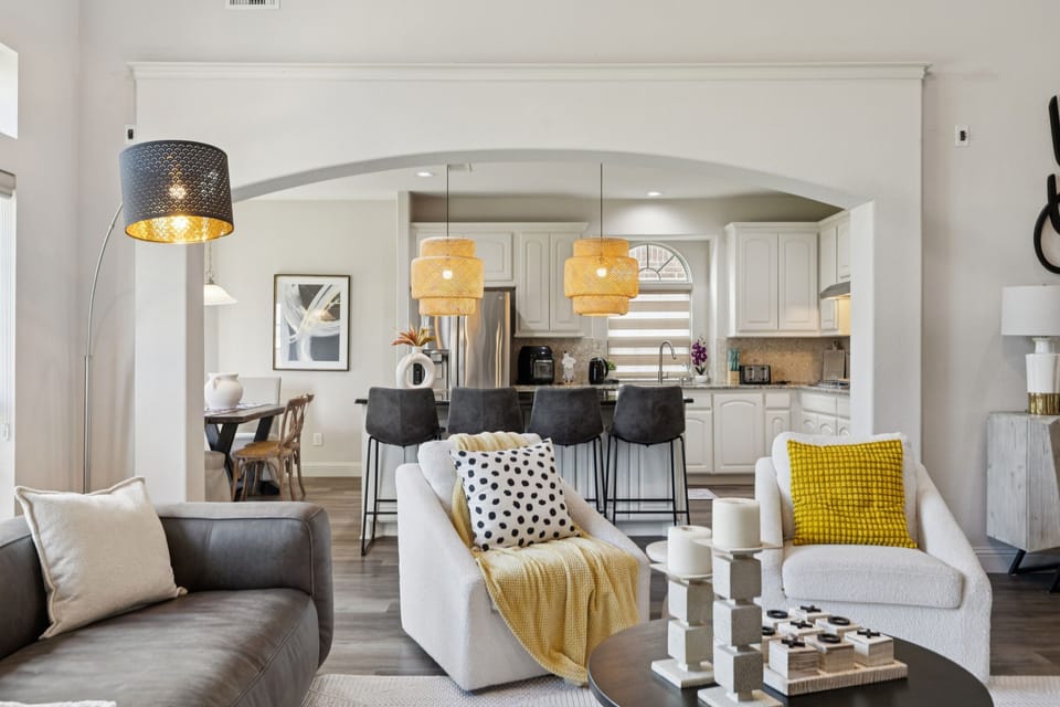 Open concept living room with Gourmet Kitchen Access