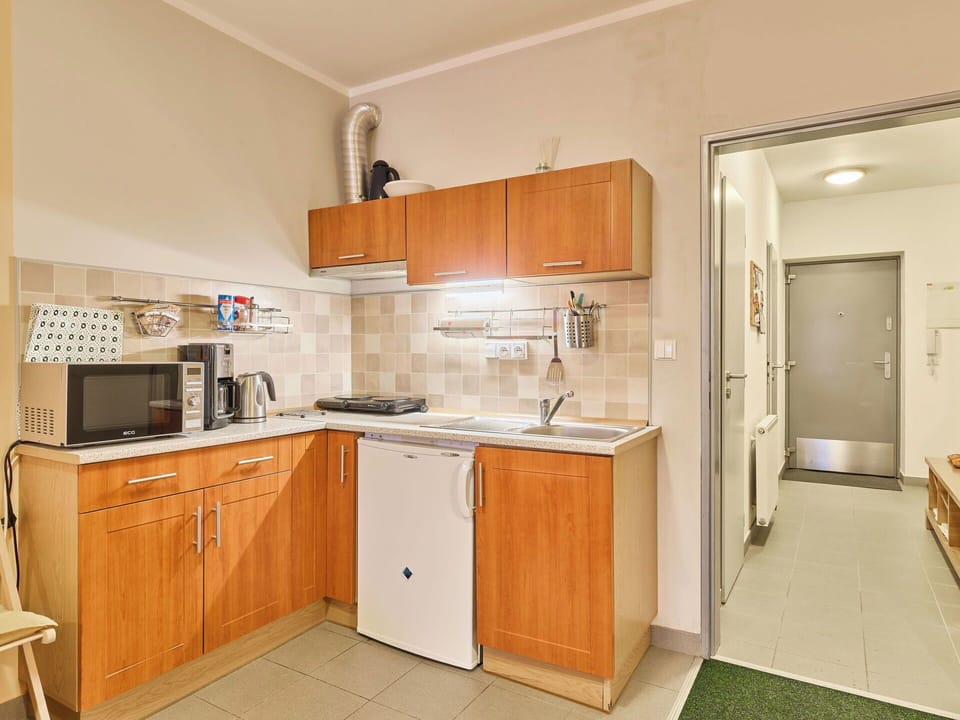 Major Appliance, Interior Design, Flooring, Cabinetry, Furniture, Floor, Kitchen Appliance, Kitchen, Room, Countertop