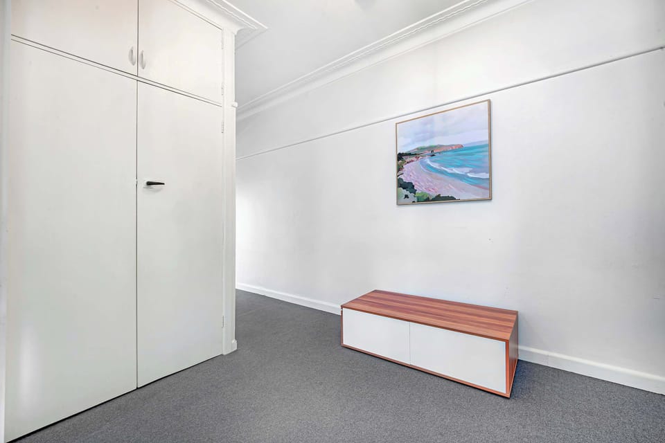 Multi-purpose room / additional storage space with bench seating.
