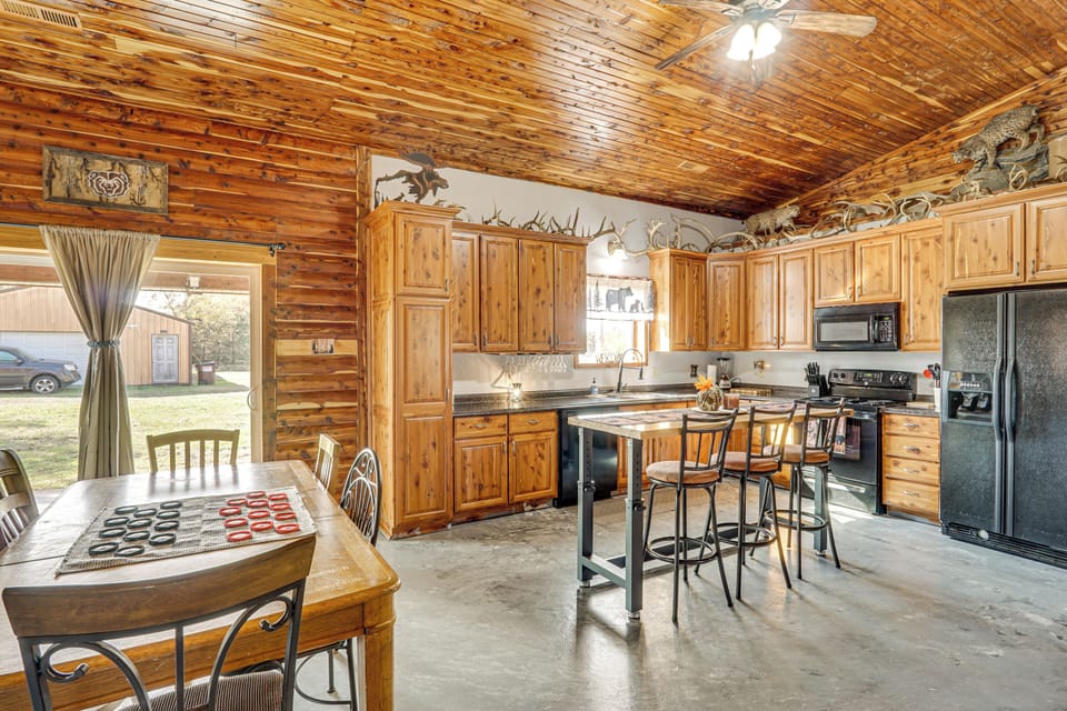 Kitchen | Dining Area | Desk | Books