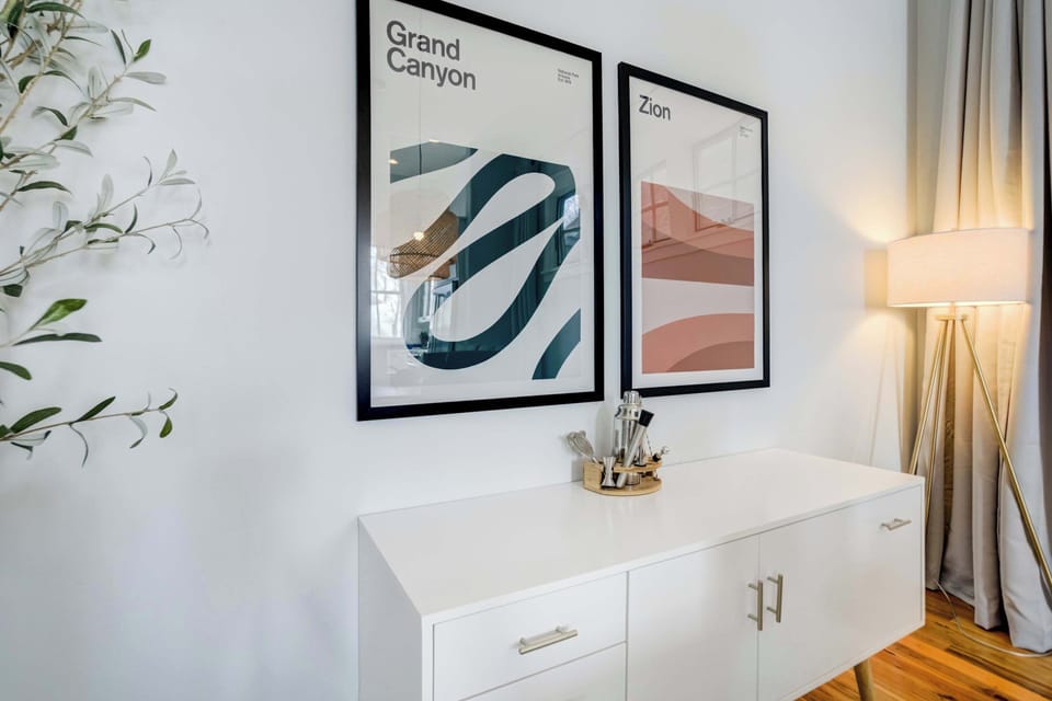 Thoughtful décor and a clean, modern sideboard add charm and function, completing the dining area’s inviting atmosphere.