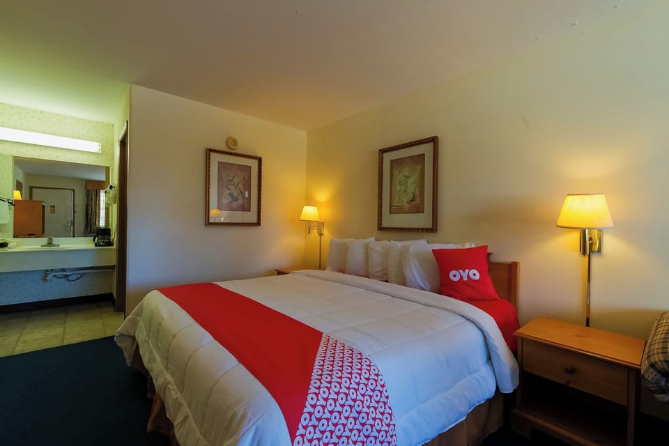 Recharge in a serene room with convenient vanity access.