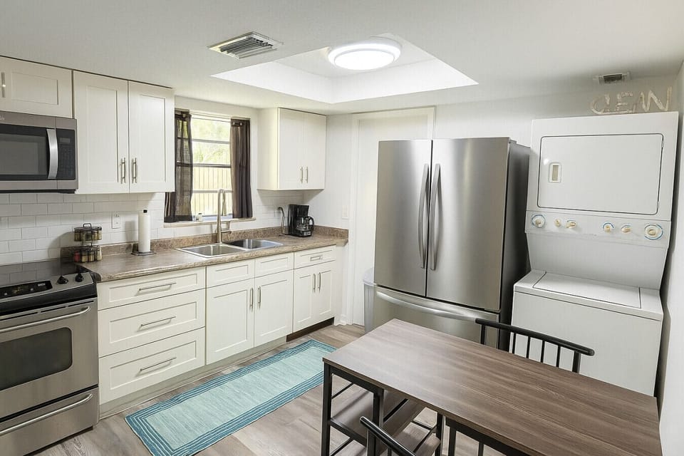 Modern appliances and utensils already in place.