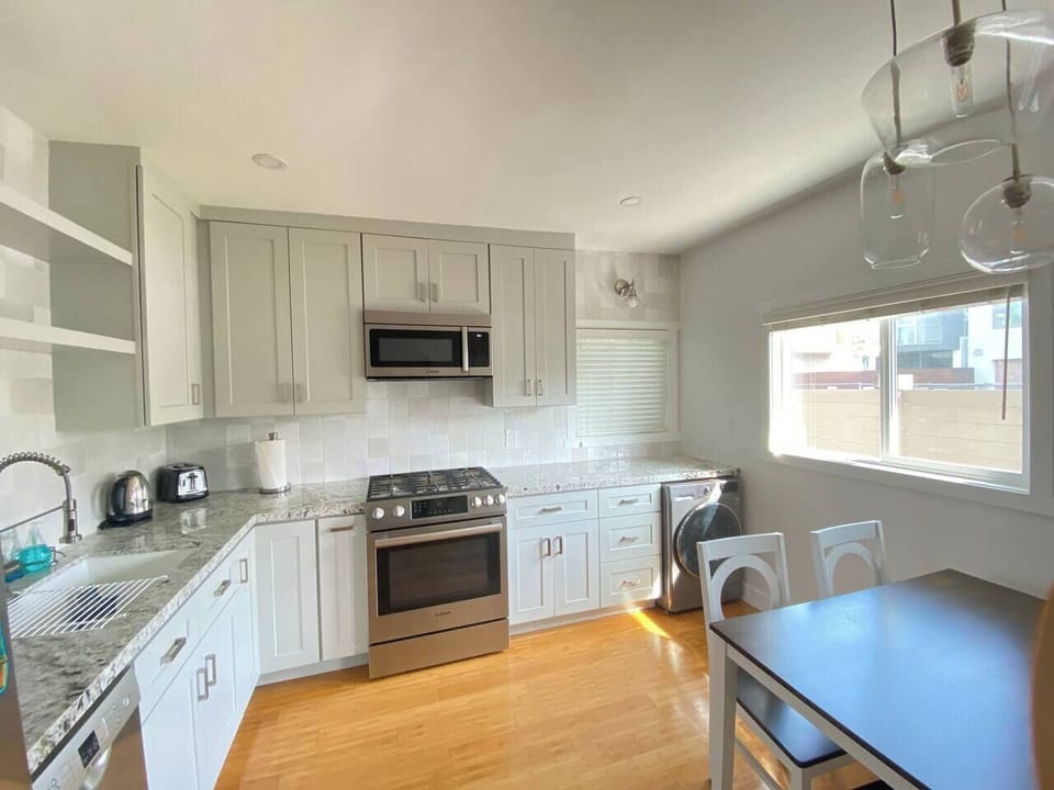 Stylish kitchen with full-size appliances and plenty of counter space.