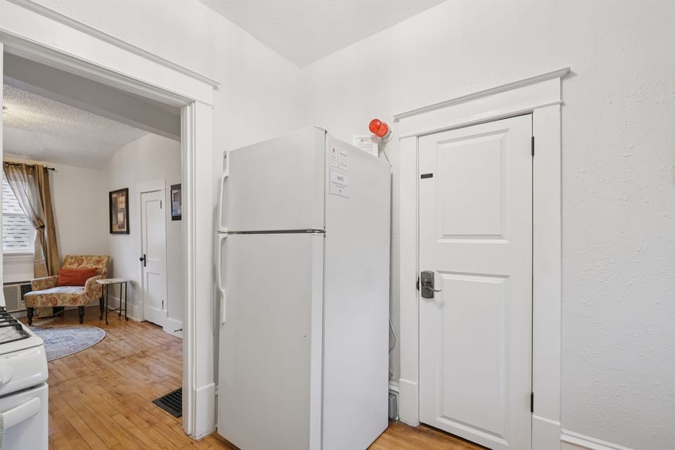 The kitchen is just off the living room. 